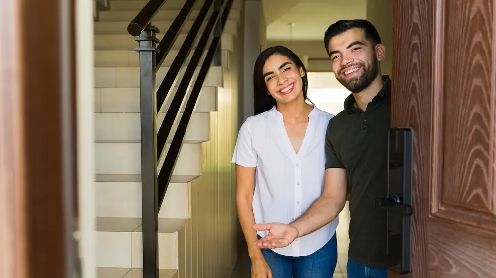 young couple moves into new home